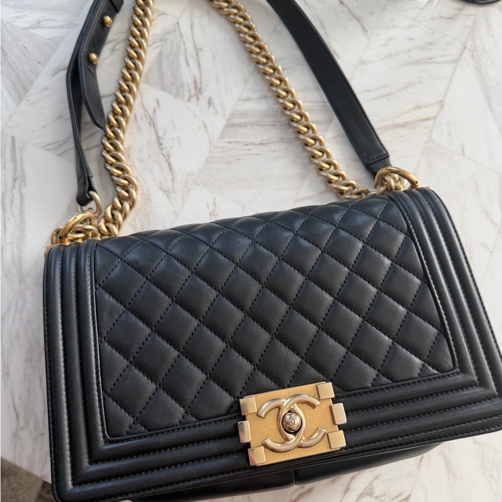 Chanel Boy in black with gold hardware
